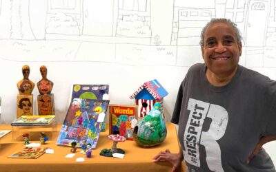 Upcycled artwork at the Art Enables YARD SALE